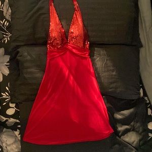 Little red, halter dress w/ red sequins on top. Size small. Never worn w/ tag.